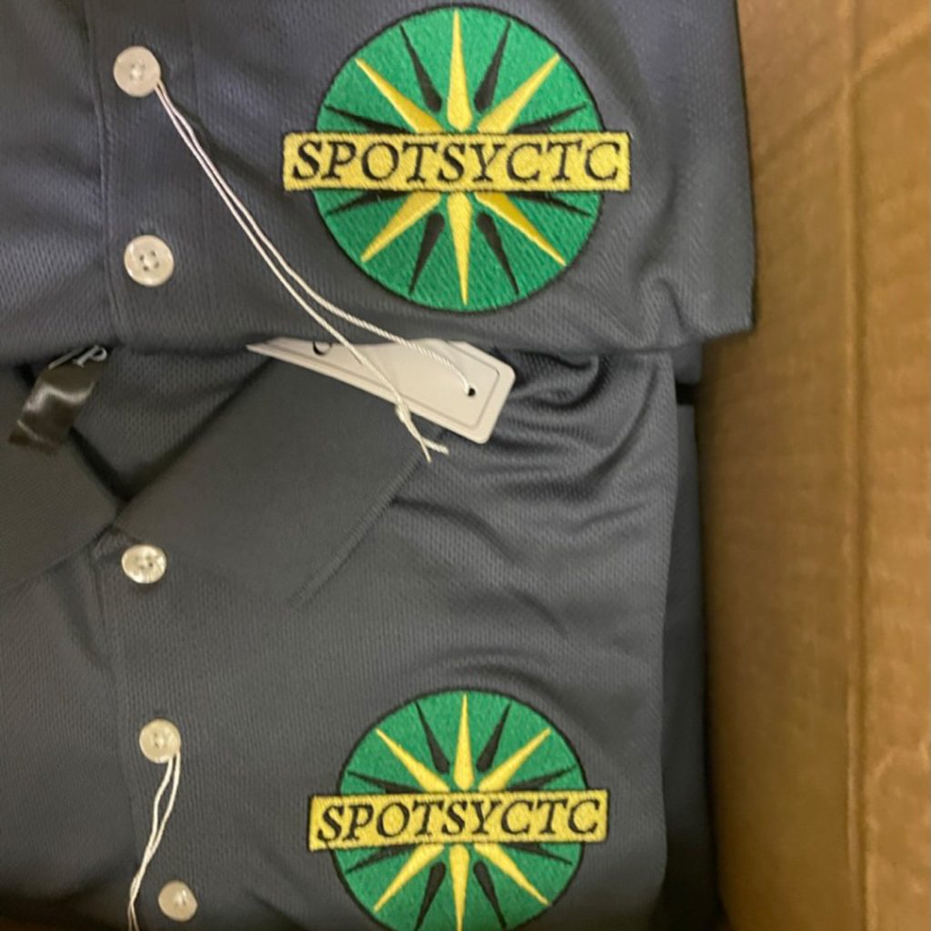 Branded custom embroidered polos ready for delivery by Core Prints Fredericksburg.
