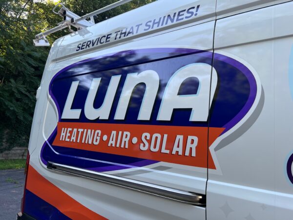 Close up view of wrapped work van for Luna, a vehicle wraps client of Core Prints in Fredericksburg, VA.